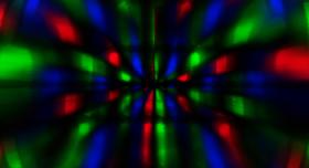 An abstract image of a colorful light pattern.